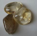 three pieces of tubled citrine birthstone